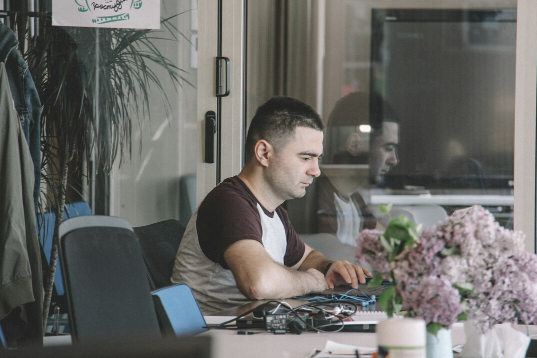 developer coding at desk