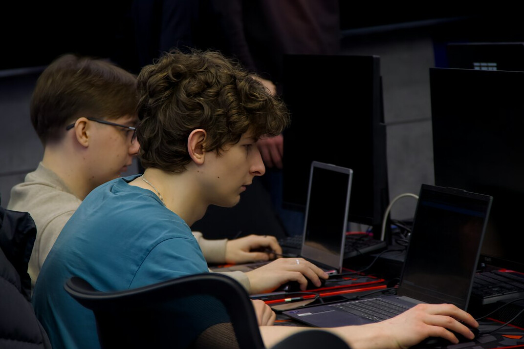 kids coding on computer